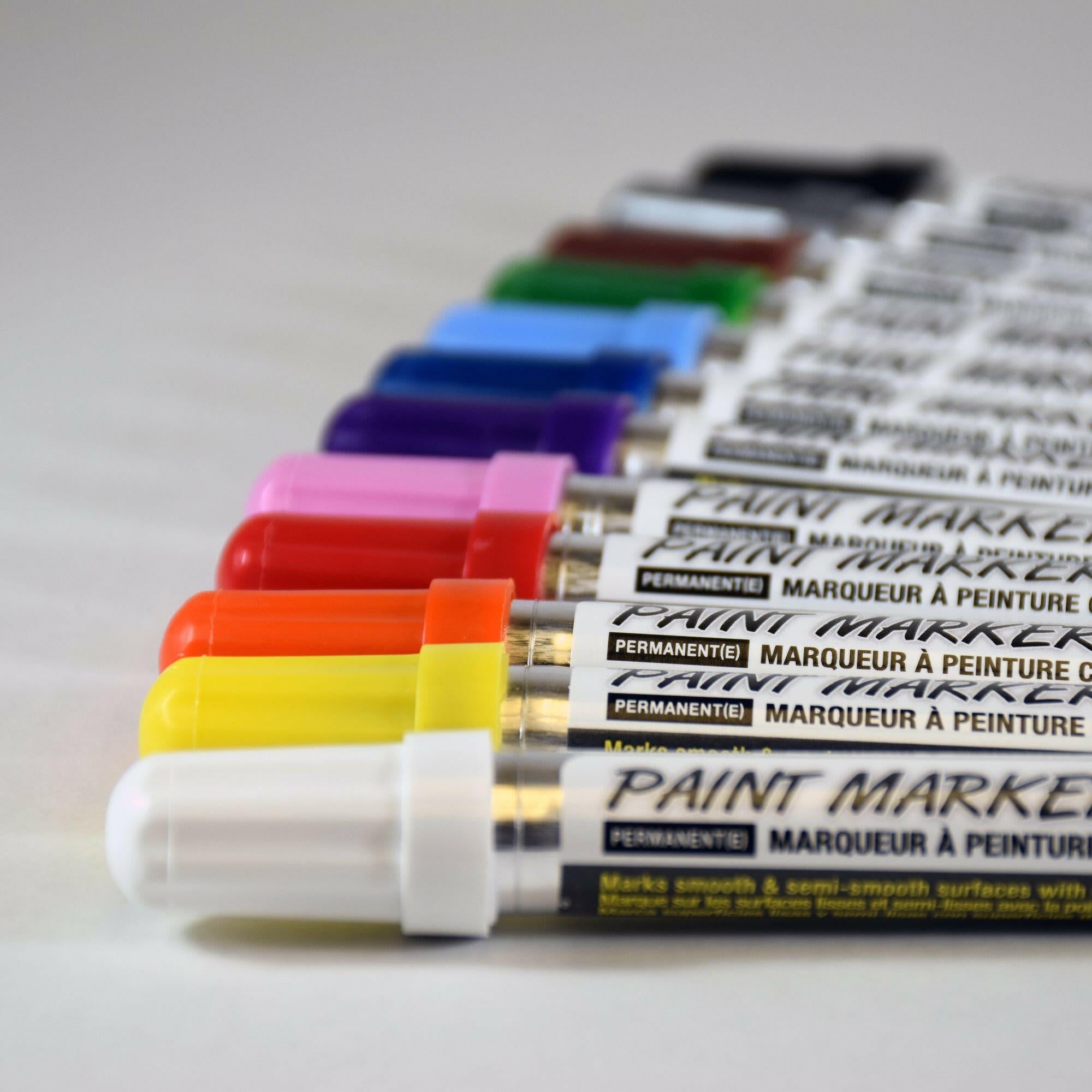 row of colorful medium tip carmel paint markers
